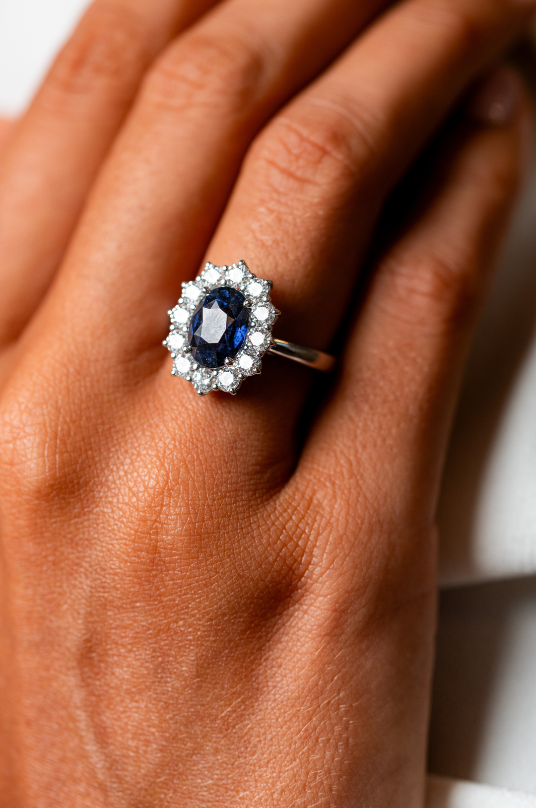 White Gold Engagement Ring with Diamonds and Sapphire