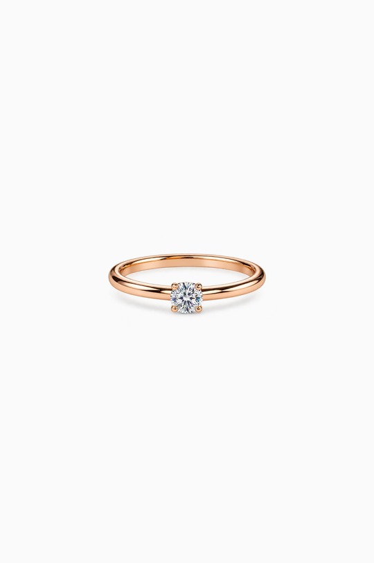 Pink Gold Engagement Ring With a Solitaire Diamond