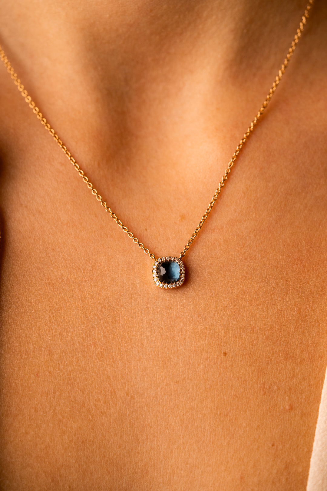 Gold with Diamonds and Blue Topaz Necklace