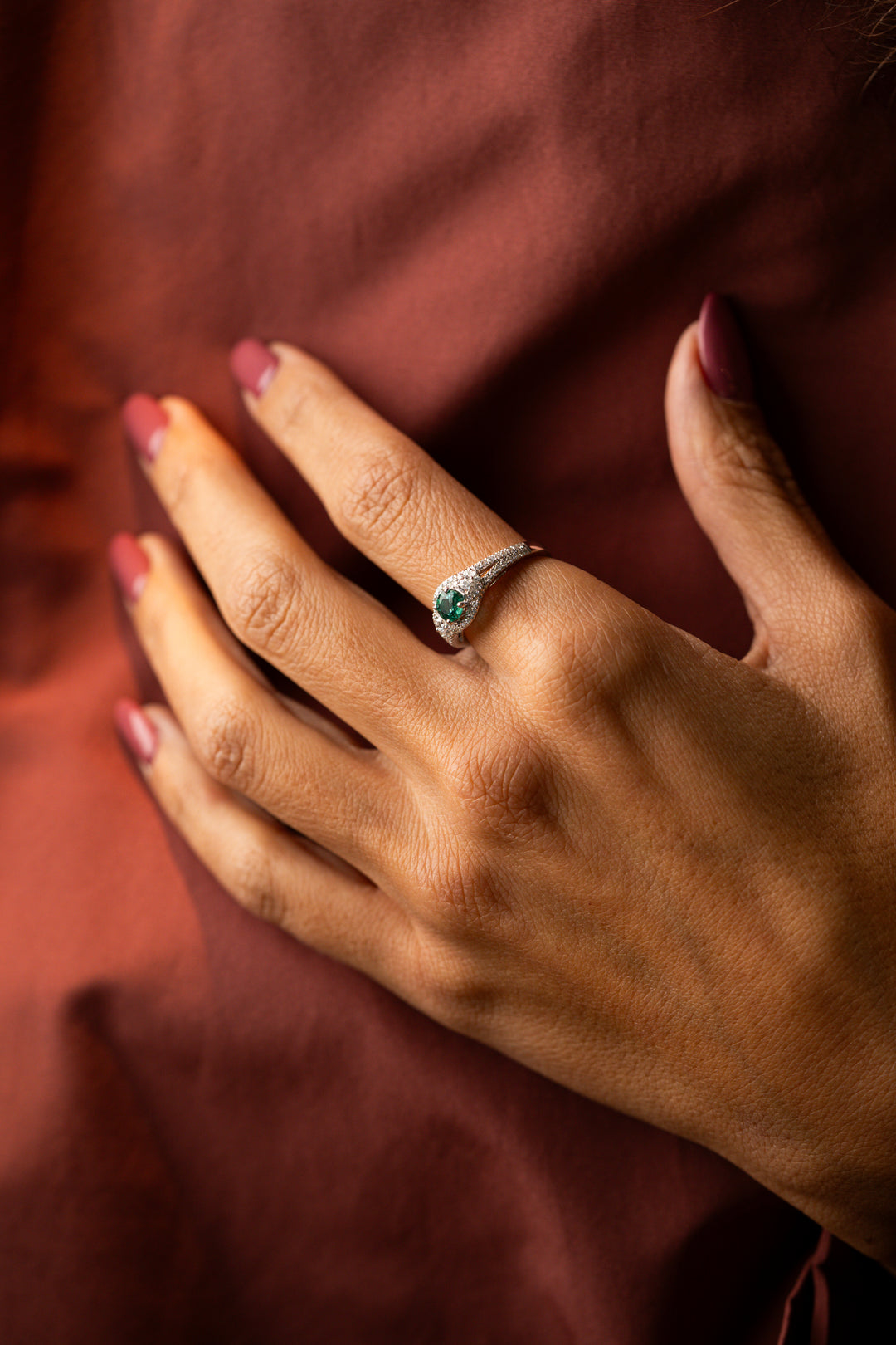 White Gold Engagement Ring with Diamonds and Green Emeralds