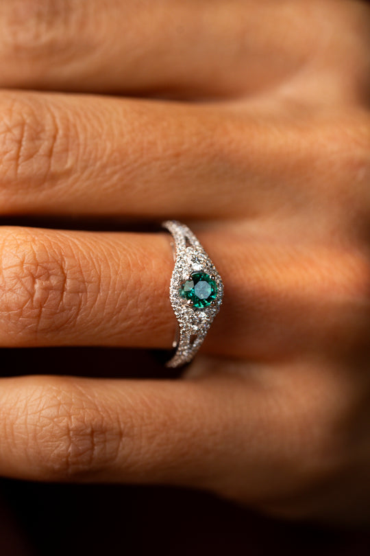 White Gold Engagement Ring with Diamonds and Green Emeralds