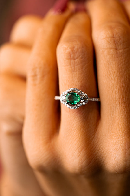 White Gold Engagement Ring with Diamonds and Green Emeralds