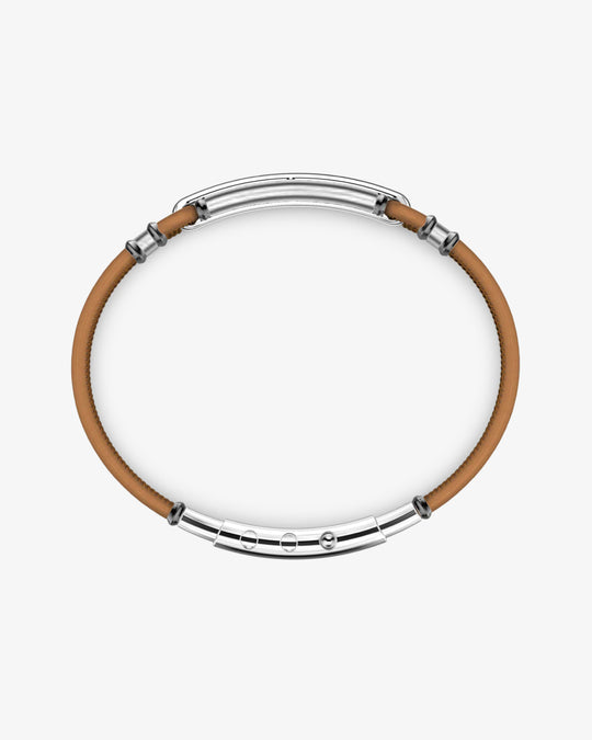 Natural leather bracelet with silver tag and black stones