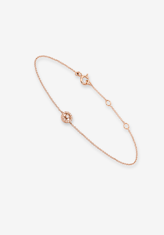 Pink Gold Circle with a Diamond in the Centre and Diamonds